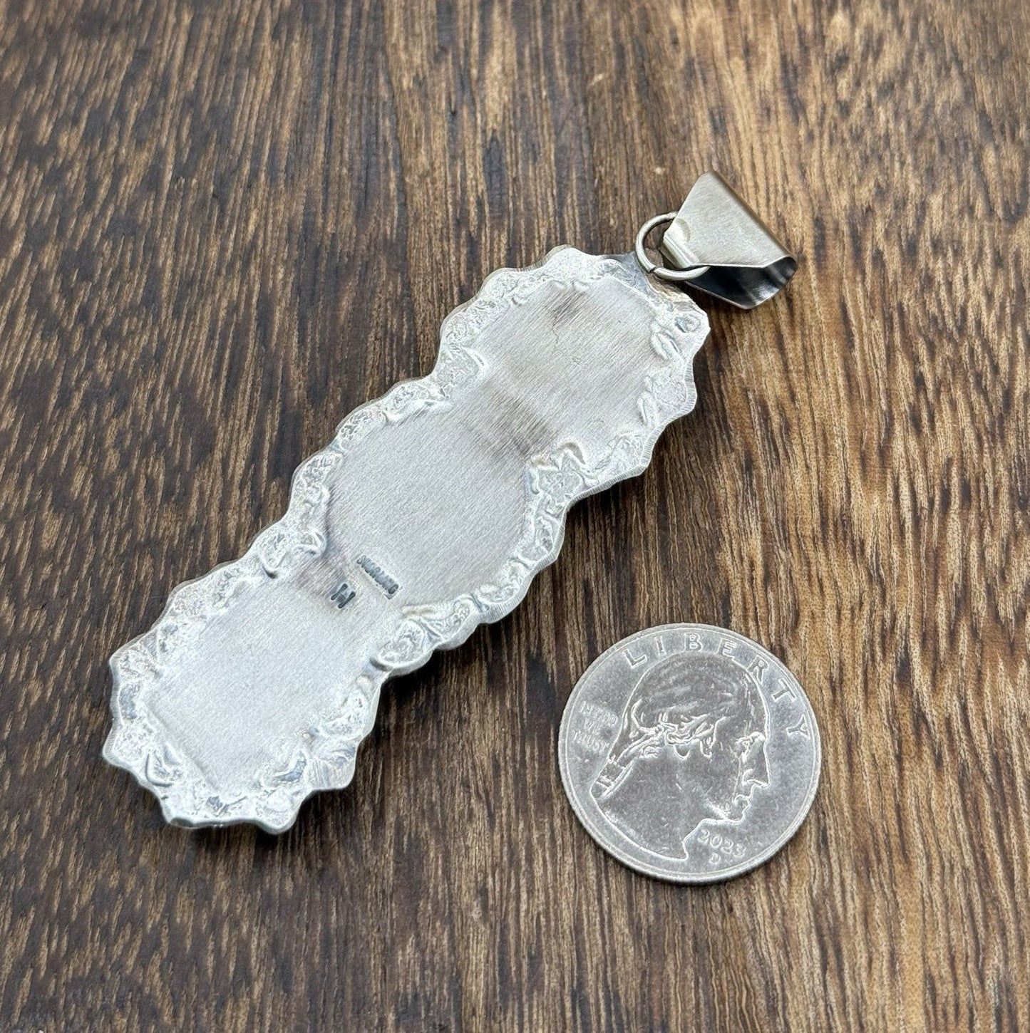 Navajo Handmade Sterling Silver Spiny Oyster Shell Stamped Drop Pendant