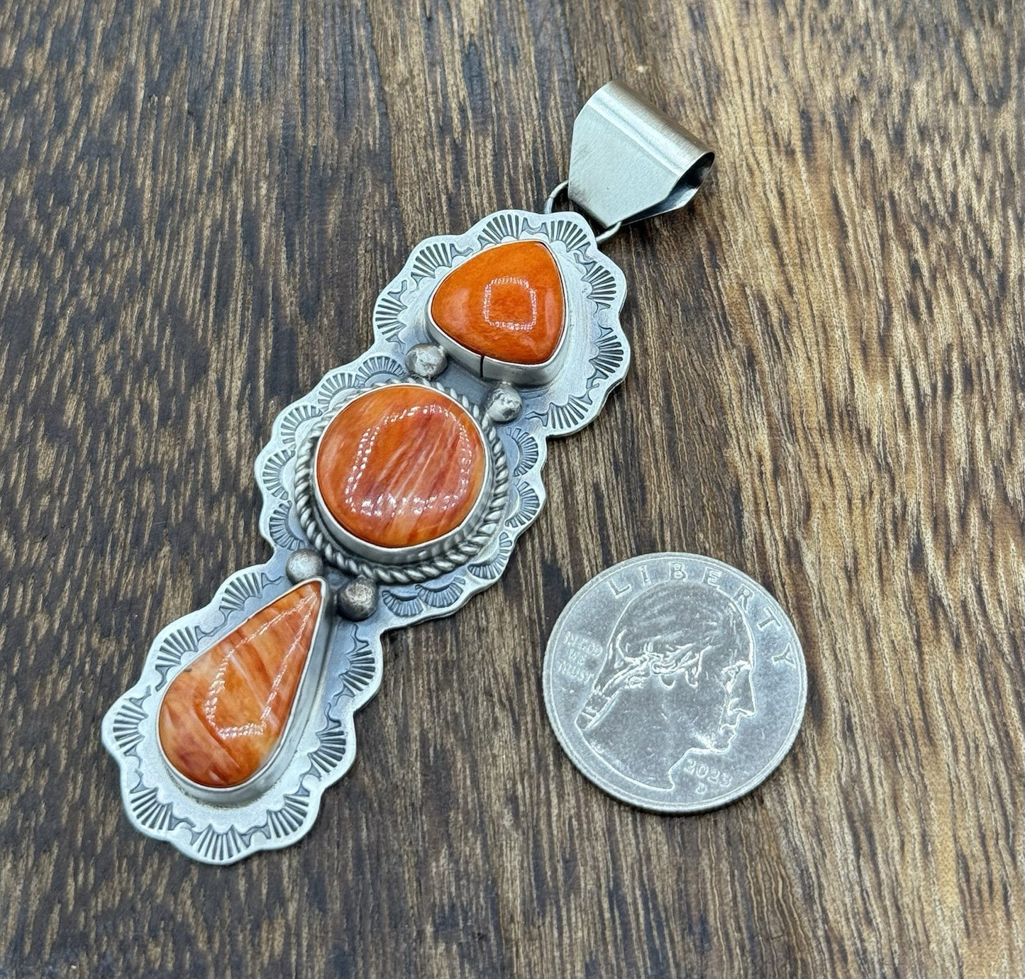 Navajo Handmade Sterling Silver Spiny Oyster Shell Stamped Drop Pendant