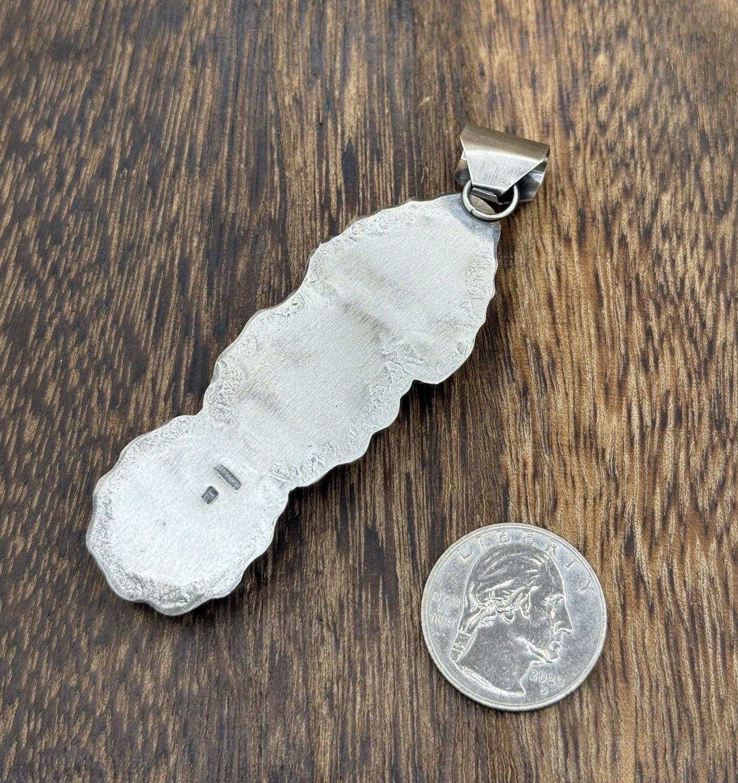 Navajo Handmade Sterling Silver Spiny Oyster Shell Stamped Drop Pendant