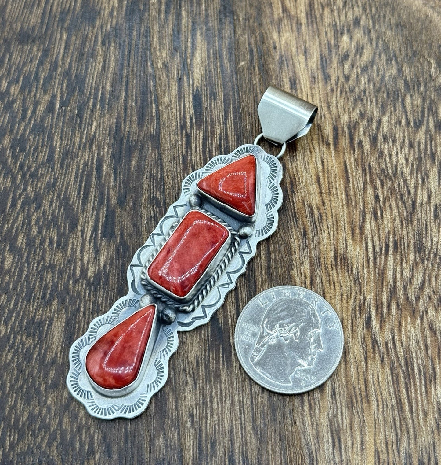 Navajo Handmade Sterling Silver Spiny Oyster Shell Stamped Drop Pendant