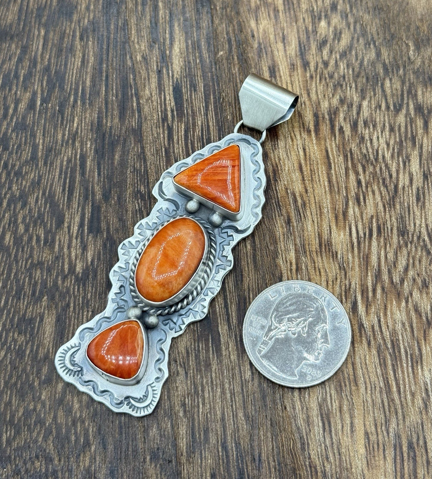 Navajo Handmade Sterling Silver Spiny Oyster Shell Stamped Drop Pendant