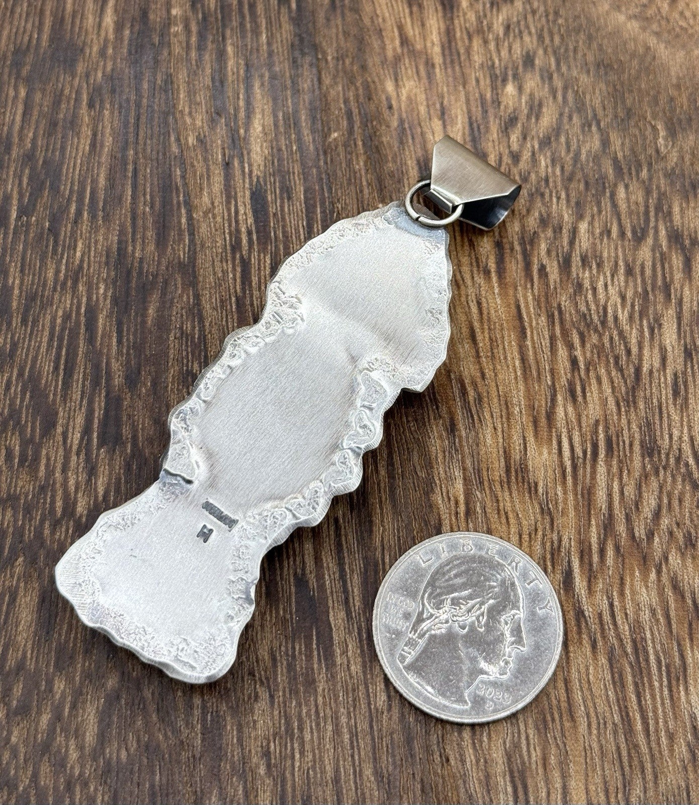 Navajo Handmade Sterling Silver Spiny Oyster Shell Stamped Drop Pendant