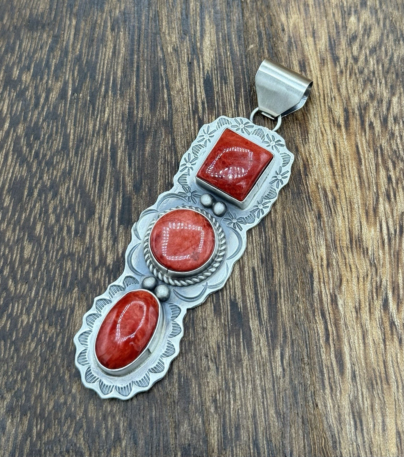 Navajo Handmade Sterling Silver Spiny Oyster Shell Stamped Drop Pendant