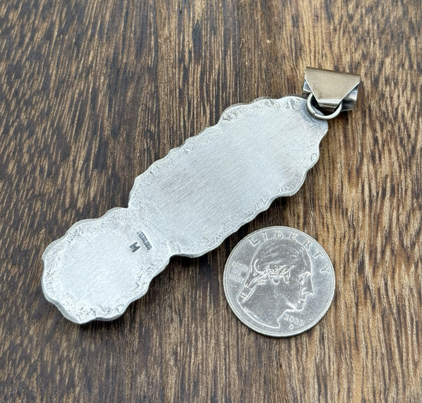 Navajo Handmade Sterling Silver Spiny Oyster Shell Stamped Drop Pendant