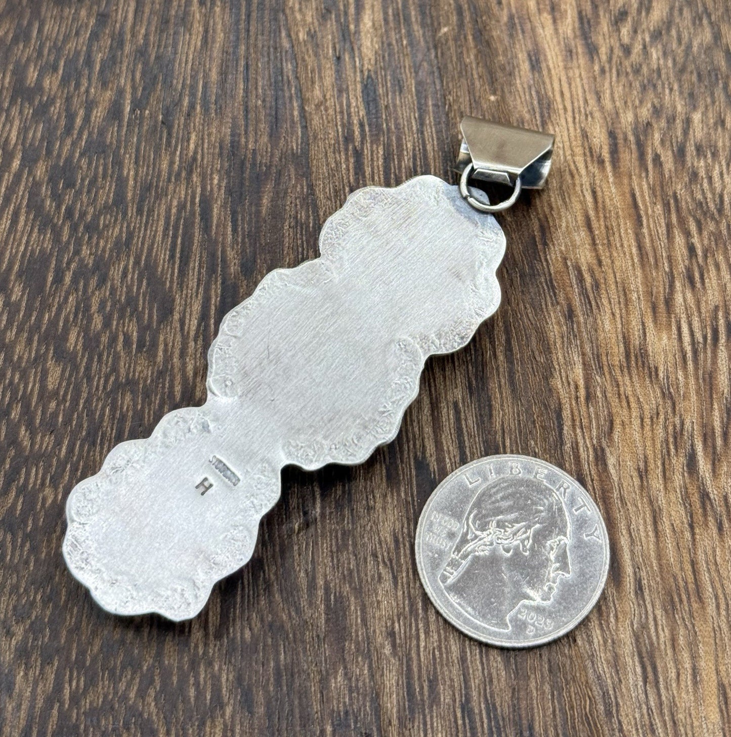 Navajo Handmade Sterling Silver Spiny Oyster Shell Stamped Drop Pendant