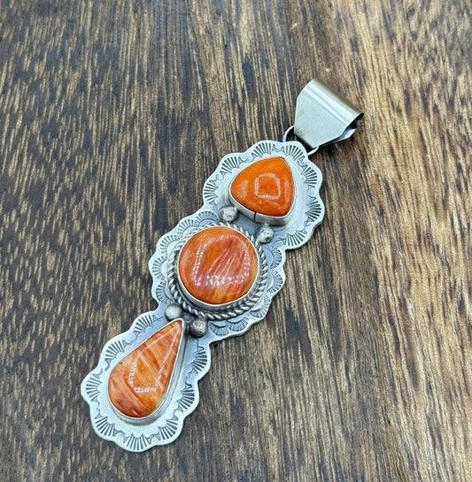 Navajo Handmade Sterling Silver Spiny Oyster Shell Stamped Drop Pendant