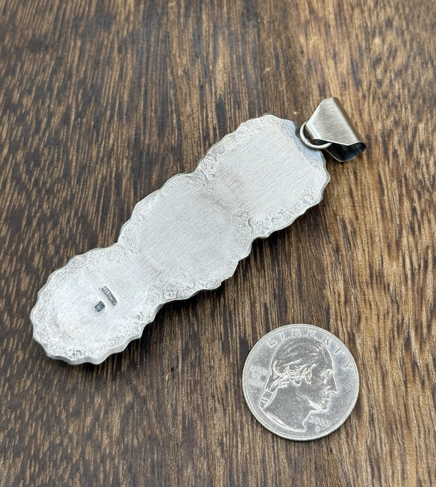 Navajo Handmade Sterling Silver Spiny Oyster Shell Stamped Drop Pendant